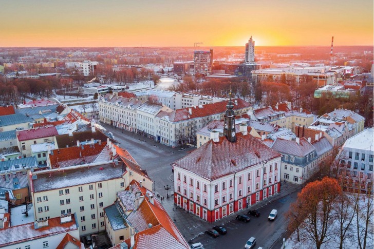 a photo of Tartu Town Hall Square at sunset